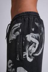 GRAPHIC-PRINT TRACK PANTS INSPIRED BY RENAISSANCE PAINTINGS