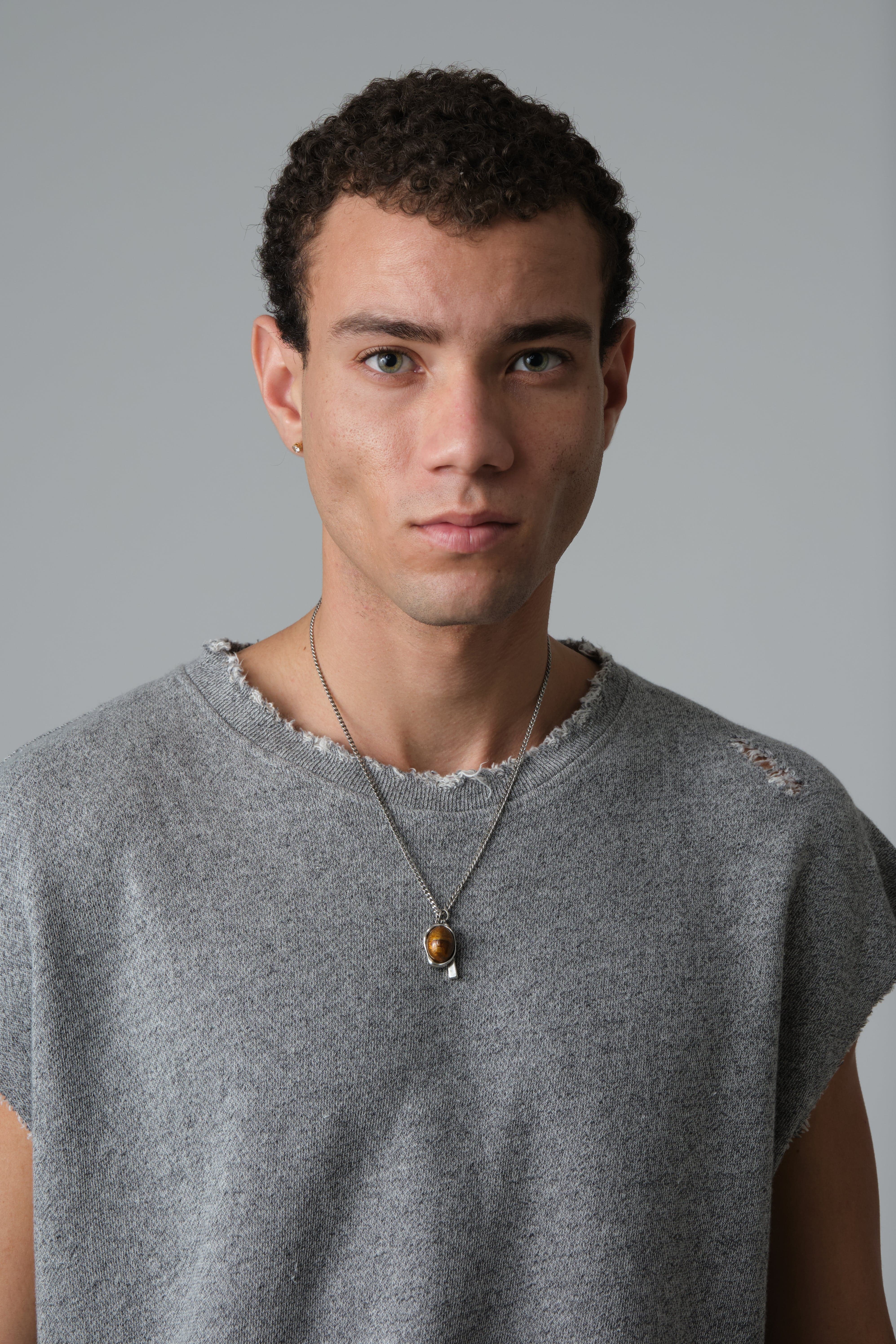COW BOY T, FEATURING HEAVILY DISTRESSED EDGES