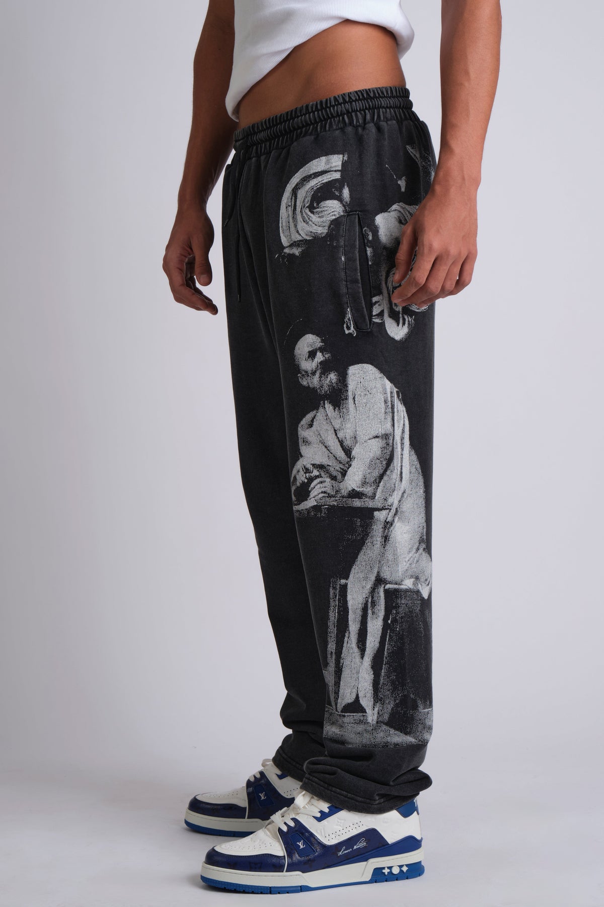 GRAPHIC-PRINT TRACK PANTS INSPIRED BY RENAISSANCE PAINTINGS