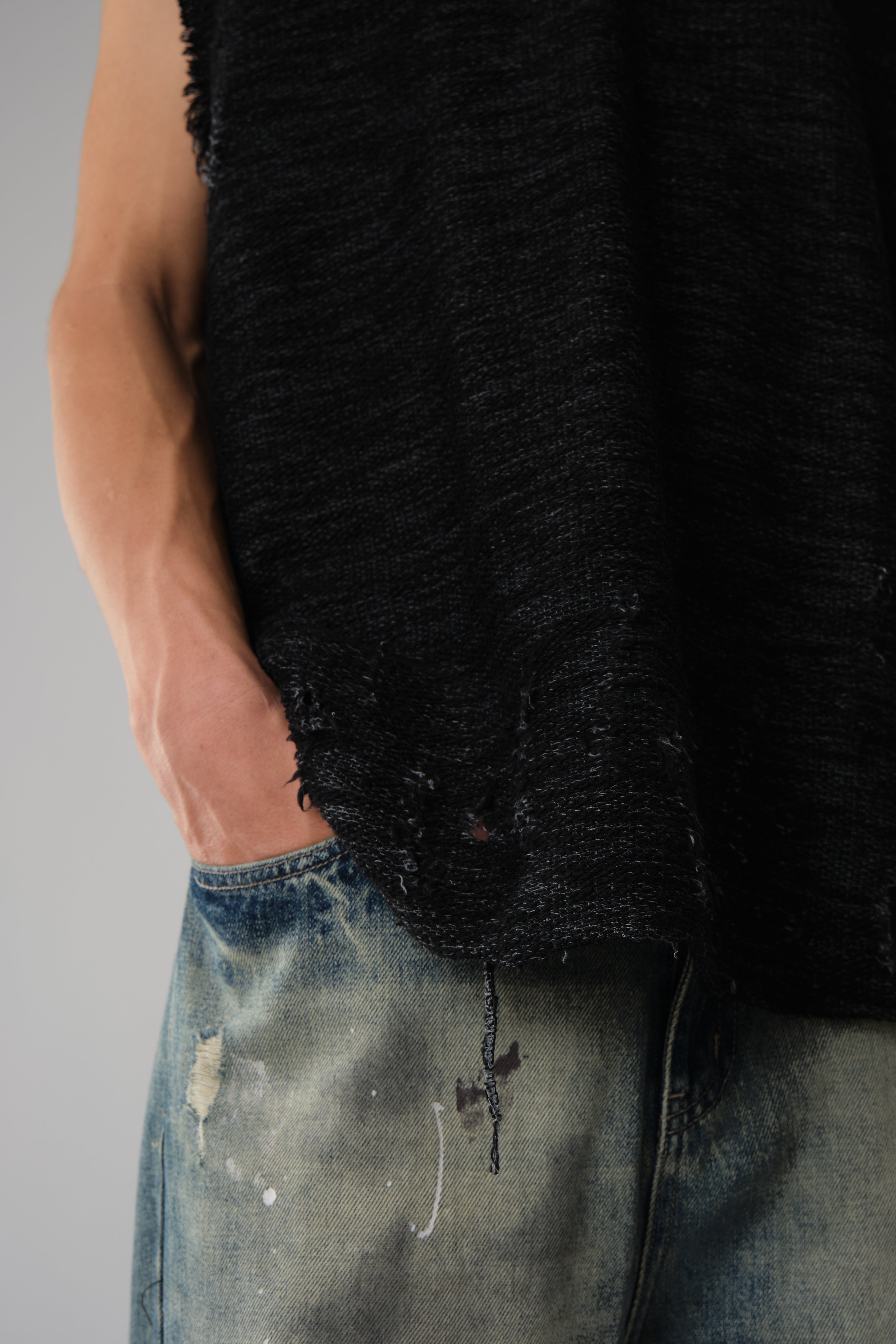 COW BOY, FEATURING HEAVILY DISTRESSED EDGES BLACK
