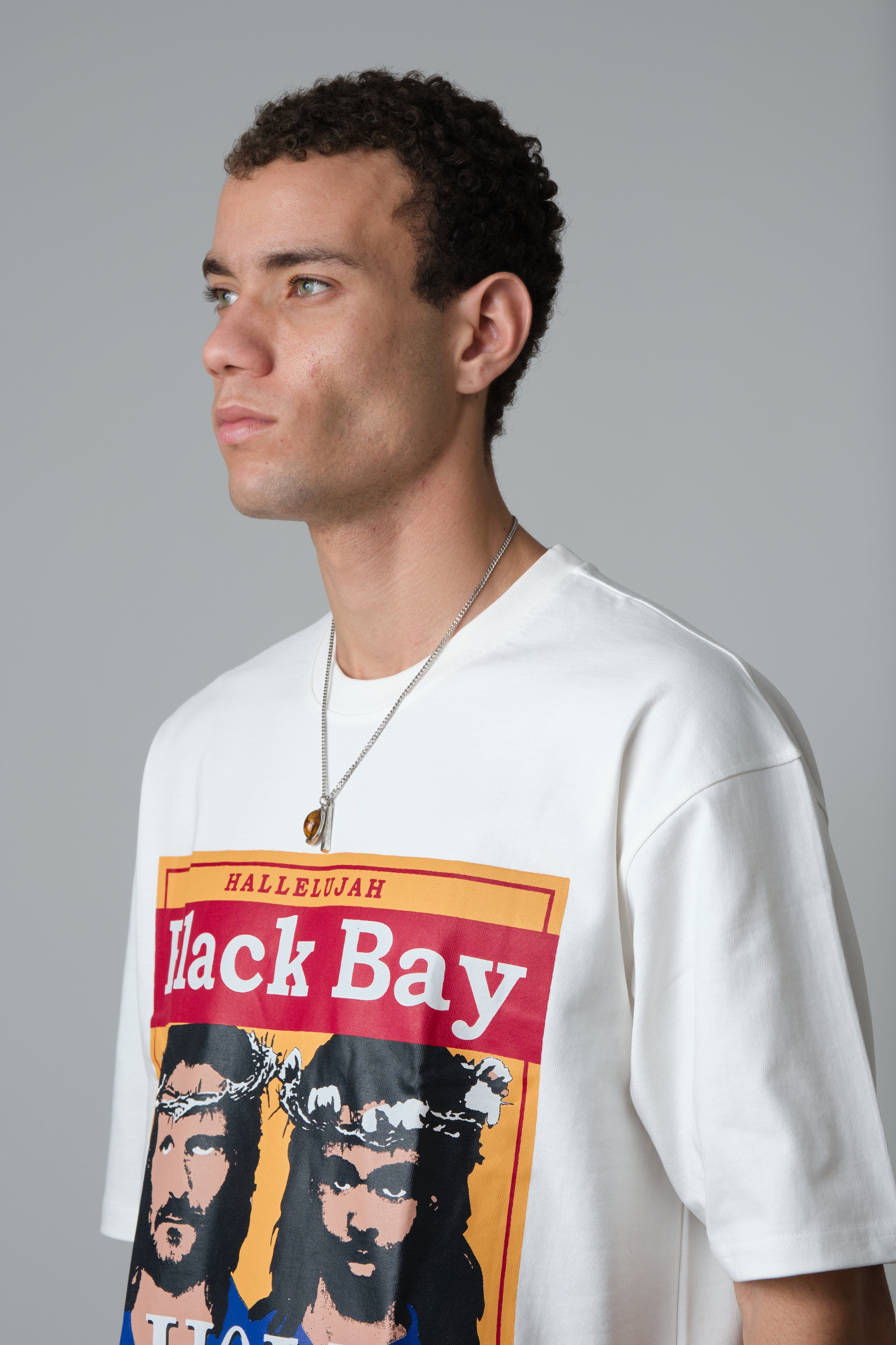 DENIM TEARS HOLYSTATE GRAPHIC T-SHIRT