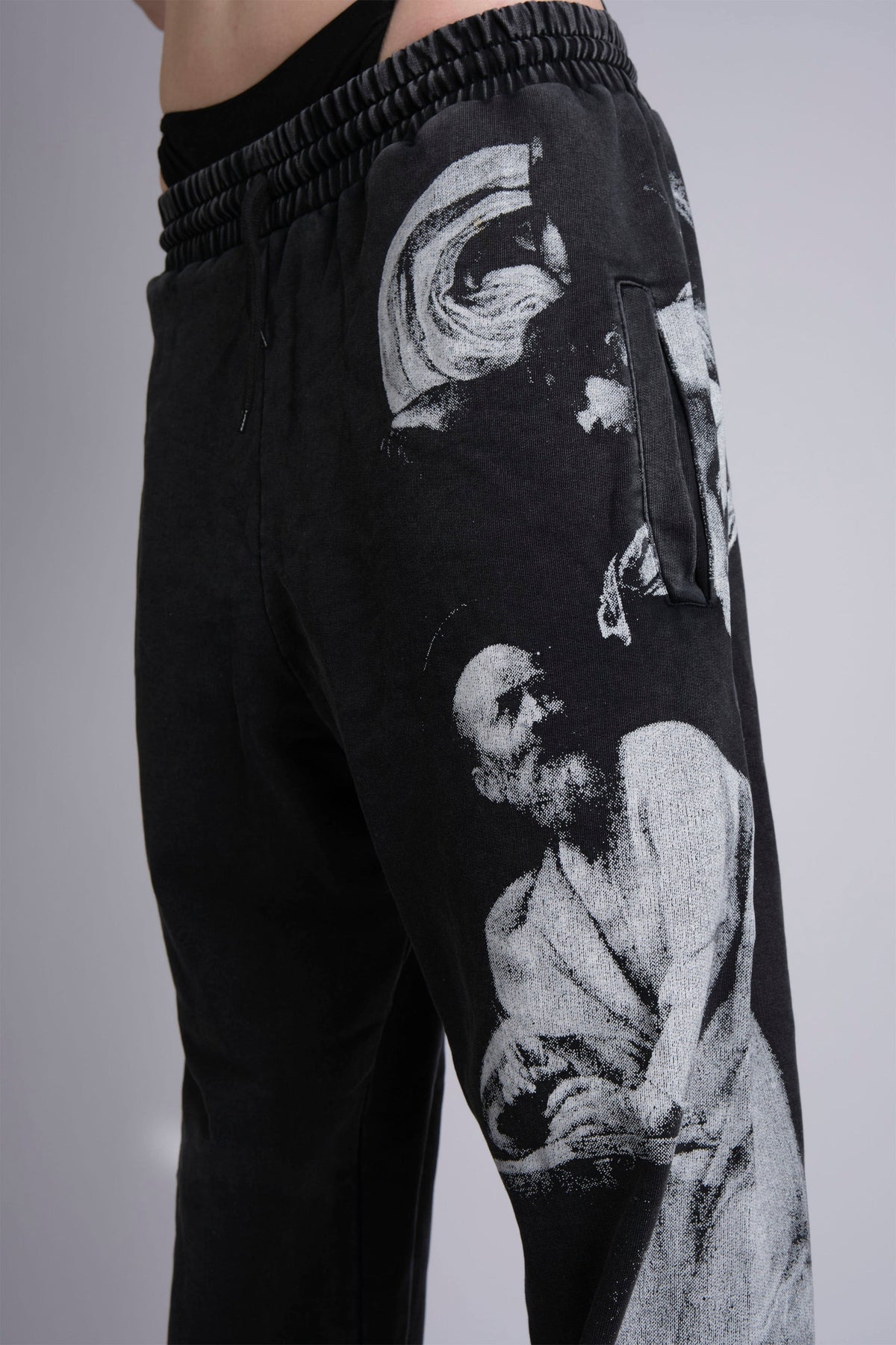 GRAPHIC-PRINT TRACK PANTS INSPIRED BY RENAISSANCE PAINTINGS