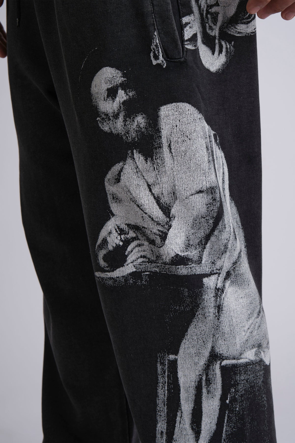 GRAPHIC-PRINT TRACK PANTS INSPIRED BY RENAISSANCE PAINTINGS