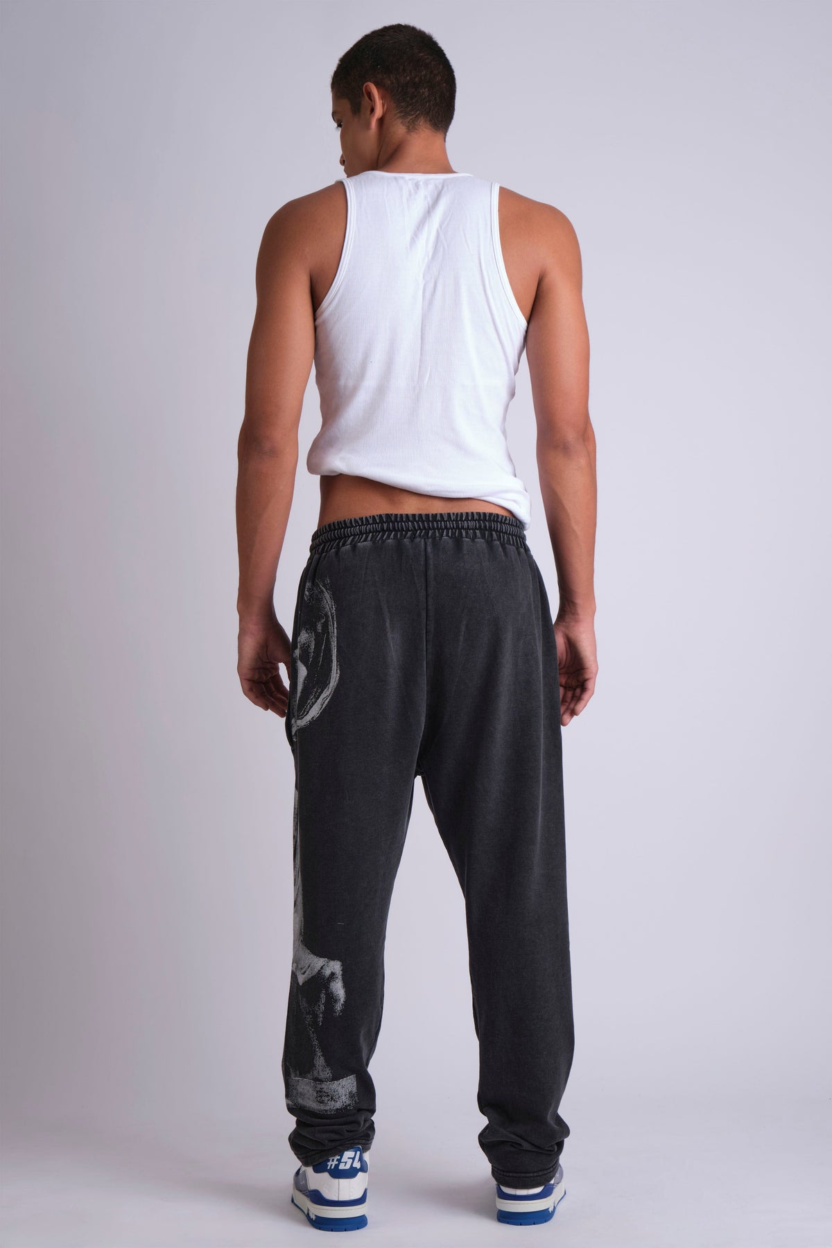 GRAPHIC-PRINT TRACK PANTS INSPIRED BY RENAISSANCE PAINTINGS